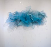 <em>Undercurrents</em>, 42 x 86 in., mesh, spay paint, jewelry wire with opttional plexiglass numbers